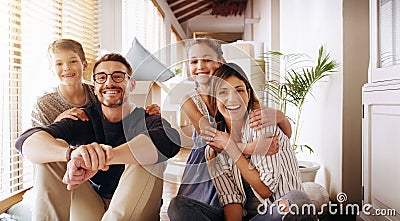 Parents, children and a portrait of a family moving house for a new start after real estate purchase. Homeowner mom, dad Stock Photo
