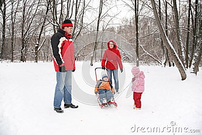 Parents with children walk in the park Stock Photo