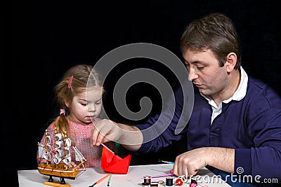 Parents and kids art and crafts Stock Photo