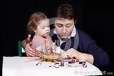 Parents and kids art and crafts Stock Photo