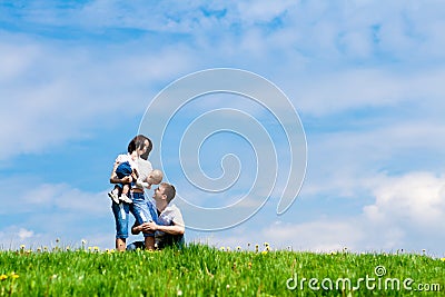 Parents playing with offspring Stock Photo