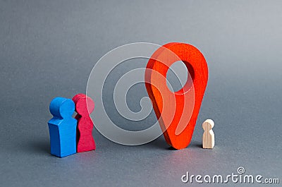 Parents in search of a lost child or adoption of a child near the location marker. The concept of finding a child, the adoption Stock Photo