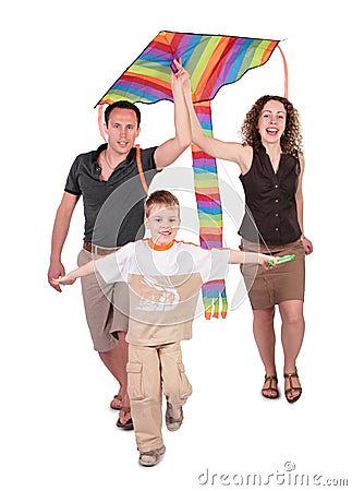 Parents and son start kite Stock Photo