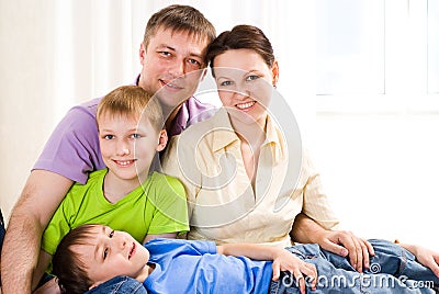 Parents with their two children Stock Photo