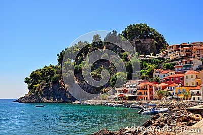 Parga, Epirus - Greece. Colorful houses amphitheatrically built next to the castle of Parga Stock Photo