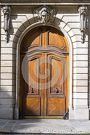 Paris, an ancient sculpted door Stock Photo