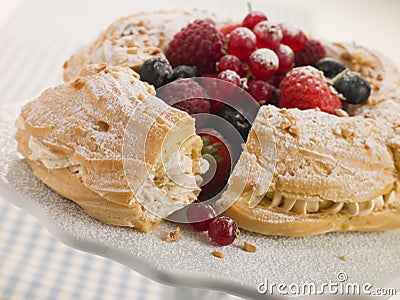 Paris Brest with Mixed Berries and Hazelnuts Stock Photo