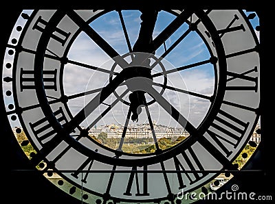 Paris cityscape through the giant clock at the Musee d'Orsay Editorial Stock Photo