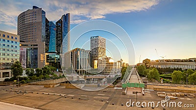 Paris Defense business district skyline and its office buildings at sunset timelapse. Paris, France Editorial Stock Photo