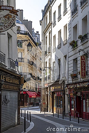 Typical haussmann buildings and restaurant in latin district in Paris Editorial Stock Photo