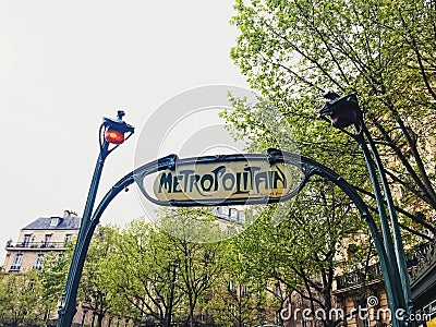 Metropolitan sign, metro entrance in Paris, France Editorial Stock Photo