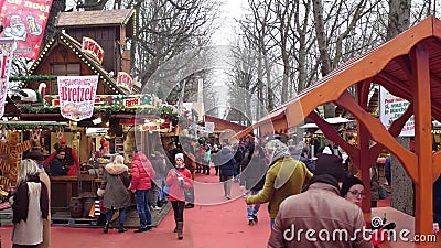 PARIS, FRANCE - DECEMBER, 31. Christmas and New Year market traditional food stalls Editorial Stock Photo