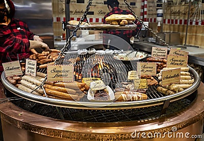 Tasty treats in traditional stalls at the Tuileries Garden Christmas Market in Paris Editorial Stock Photo
