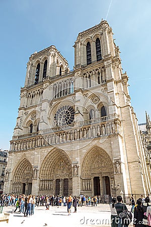 Paris, France - famous Notre Dame cathedral facade saint statues. UNESCO World Heritage Site Editorial Stock Photo