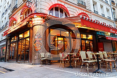 Empty outdoor terrace of Parisian cafe Bar du Marche in Paris city centre on a cloudy winter morning Editorial Stock Photo