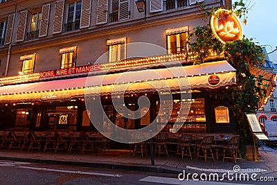 Empty outdoor terrace of Parisian cafe Le Chai Saint Germain in Paris city centre on a cloudy winter morning Editorial Stock Photo