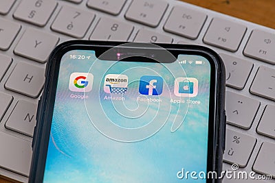 Paris, France - February, 20, 2020 : Mobile phone displaying the Gafa site : GAFA apps and icons on an iPhone. Google, Amazon, Fa Editorial Stock Photo