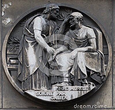Marc Aurele heals by Galen. Stone relief at the building of the Faculte de Medicine Paris Stock Photo