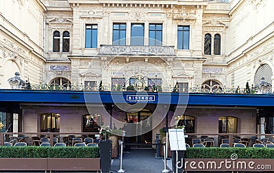 The traditional French cafe bistro 25 on Champs Elysees avenue, Paris, France. Editorial Stock Photo