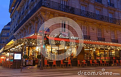 The traditional parisian restaurant Etoile 1903 at night . It located avenue Wagram in Paris, France Editorial Stock Photo