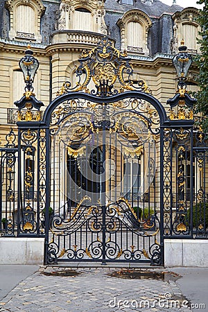 Black and golden gate of Marcel Dassault building hosts Artcurial auction house in Paris, France Editorial Stock Photo