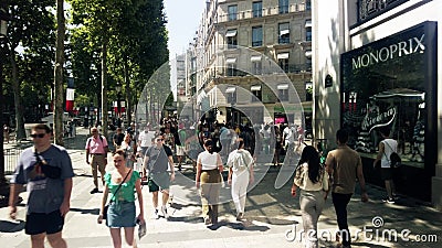 PARIS, FRANCE - JULY 14, 2022. Crowded Champs-Elysees street on Bastille Day, a major national French holiday Editorial Stock Photo