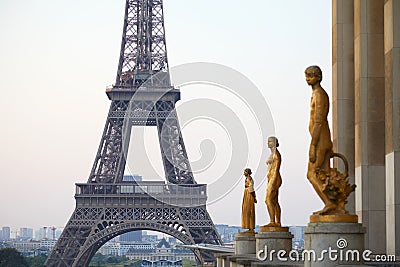 Eiffel tower and golden statues, morning in Paris, France Stock Photo