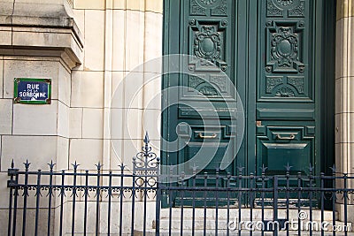 Entrance to the National Charter School at the University of Sorbonne in Paris and a sign with the inscription Rue de la sorbonne Editorial Stock Photo