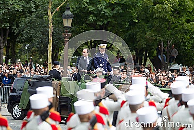 Paris. France. July 14, 2012. French President Francois Hollande welcomes servicemen and citizens during the parade. Editorial Stock Photo