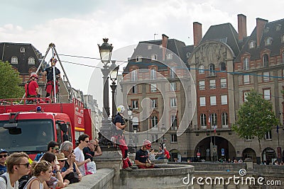 Rescue truck on the Pont Neuf bridge conducts exercises to save people on the water Editorial Stock Photo