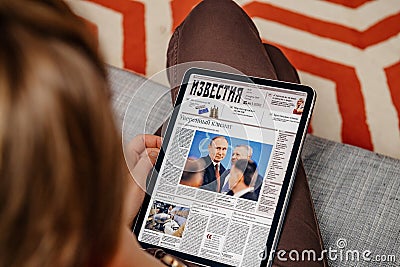 Russian newspaper Izvestia featuring Putin Editorial Stock Photo
