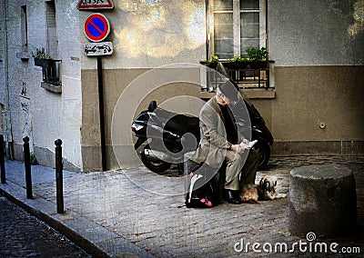 PARIS, FRANCE: June 06, 2013 - a fragment of the street. Parisian sits and reads the news in the local newspaper Paris. Editorial Stock Photo