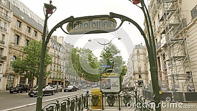 PARIS, FRANCE - JUNE 11, 2023. Iconic old Parisian retro station Boissiere entrance, 1900 Art nouveau Editorial Stock Photo