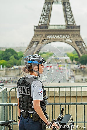 Eiffel Tower Police woman Editorial Stock Photo