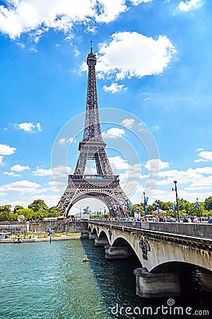 Paris, France - June 19, 2015: View of the bridge and Eiffel Tower Editorial Stock Photo