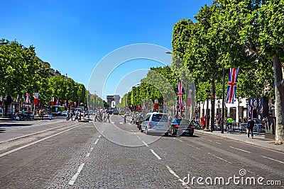 PARIS, FRANCE - JUNE 2014: Wiev of famous avenue Champs-Elysees Editorial Stock Photo