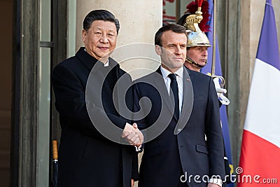 PARIS, FRANCE - MARCH 25, 2018 : Emmanuel Macron welcoming Xi Jinping at ElysÃ©e Palace Editorial Stock Photo