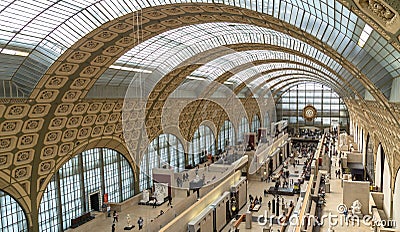 Paris, France, March 28 2017: Visitors in the Musee d`Orsay in Paris, France. The museum houses the largest collection Editorial Stock Photo