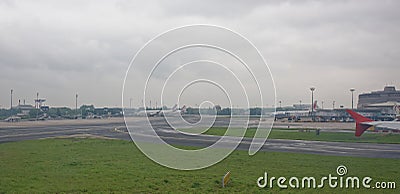 Paris Charles de Gaulle Airport.Workers serve aircraft Editorial Stock Photo