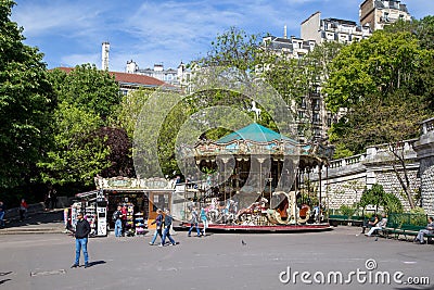 Carousel at Sacre Coeur Basilica in Paris Editorial Stock Photo