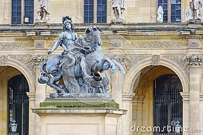 Paris, France - May 1, 2017: Statue of King Louis XIV in the courtyard of the Louvre Museum (Musee Du Louvre) on May 1, 2017, in Editorial Stock Photo