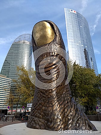 Paris /France - November 01 2017: The bronze monument to the thumb Le Pouce by sculptor Cesar Baldaccini. Editorial Stock Photo