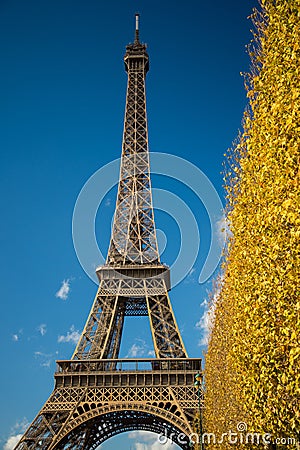 PARIS, FRANCE - NOVEMBER 9, 2014 Eiffel Tower over blue sky and Editorial Stock Photo