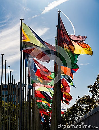 Flags fluttering in the wind in front of the UNESCO in Paris, France Editorial Stock Photo