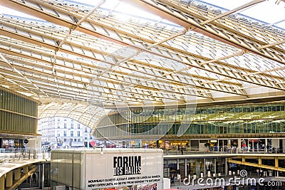 A vast glass canopy covers the patio of the Forum des Halles underground shopping mall in Paris Editorial Stock Photo