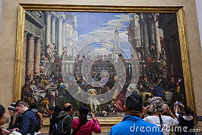 PARIS, FRANCE - October 3, 2016: Unidentified Visitors Visit Paolo Veronese`s Painting Editorial Stock Photo