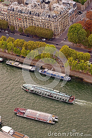 Cruise ship or boat for tourists on Seine River. aerial view from Eiffel Tower. Paris Editorial Stock Photo