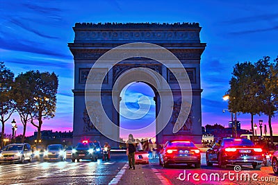 Dramatic night view of the stunning Arc de Triomphe in Paris Editorial Stock Photo