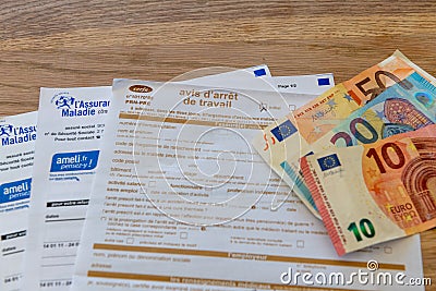 French document of sick leave, stoppage of work, and Vitale card Editorial Stock Photo