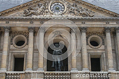 Sightseeing of Paris. FaÃ§ade of the The National Residence of the Invalids. Statue of Napoleon in the court. Stock Photo